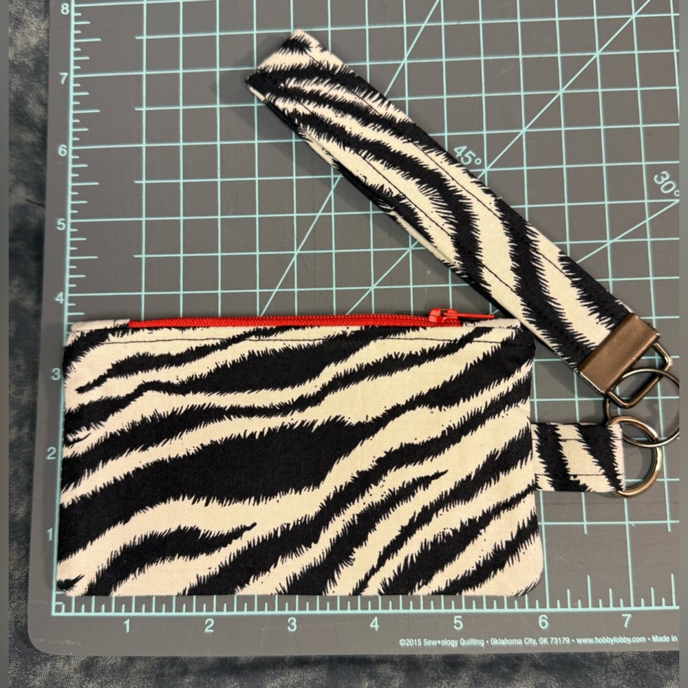 Zebra Print Wristlet with Red Zipper